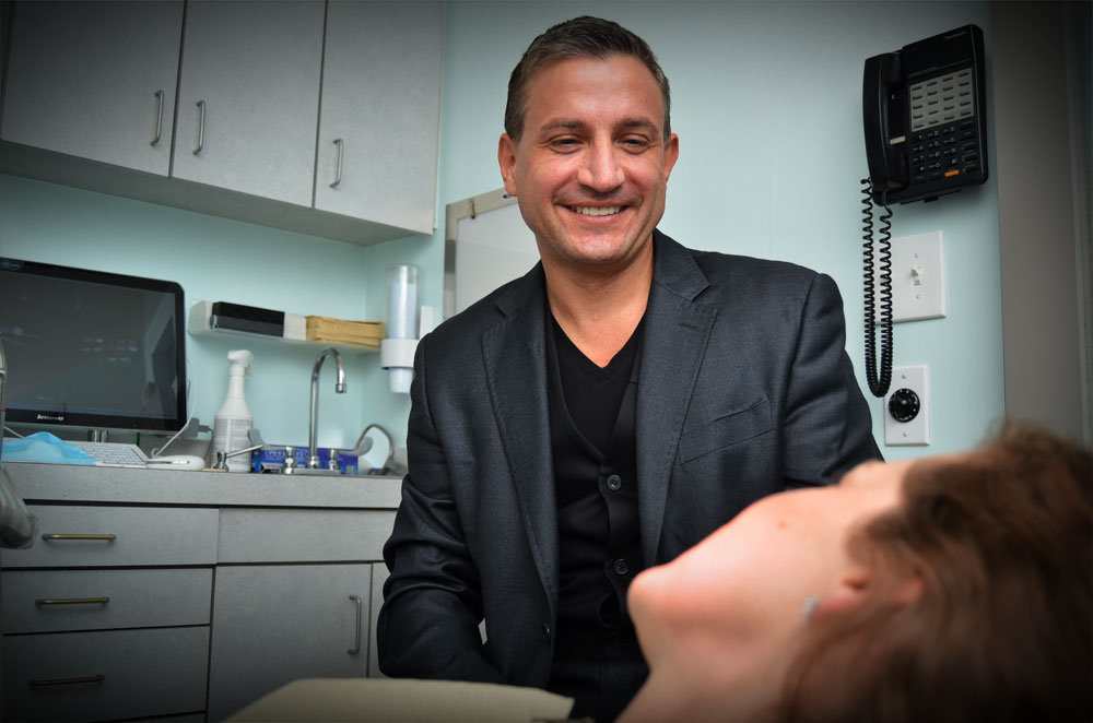 Dr Joseph Salim consulting a patient